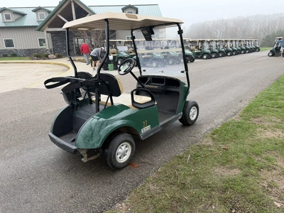 (1) 2015 E-Z-Go golf cart with a Kawasaki gas engine, does not include Club canopy, includes ball wa...