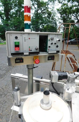 USED NEWMAN WRAP AROUND LABELER NV II