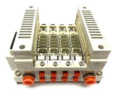 VV5Q11-04N3FS0-D0RS | SMC  Plug In Manifold Assembly 4-Port - Used