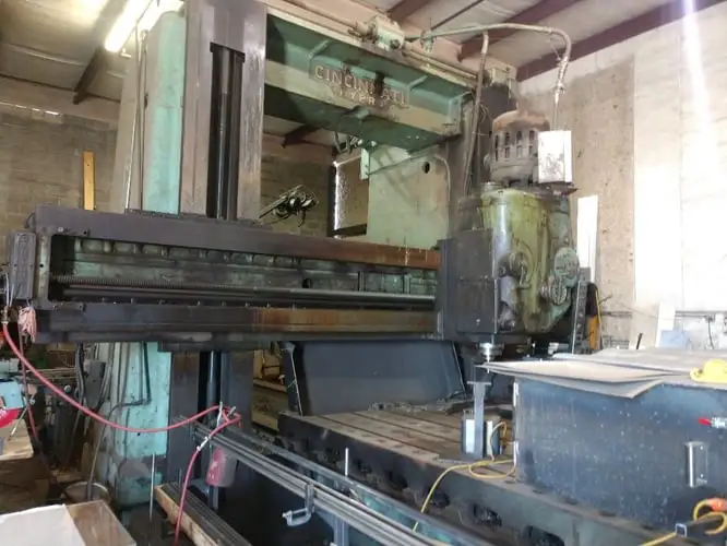 Cincinnati planer mill, 82" x 252" table, 2 heads