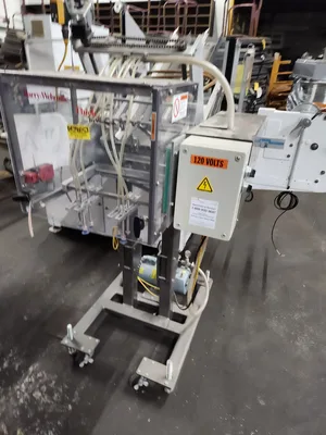 USED 2003 BARRY-WEHMILLER THIELE TECHNOLOGIES, INC. RECIPROCATING PLACER