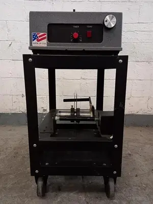 Advent model 310 semi-automatic pressure sensitive wraparound labeler