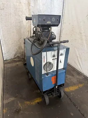 USED MILLER CP–300