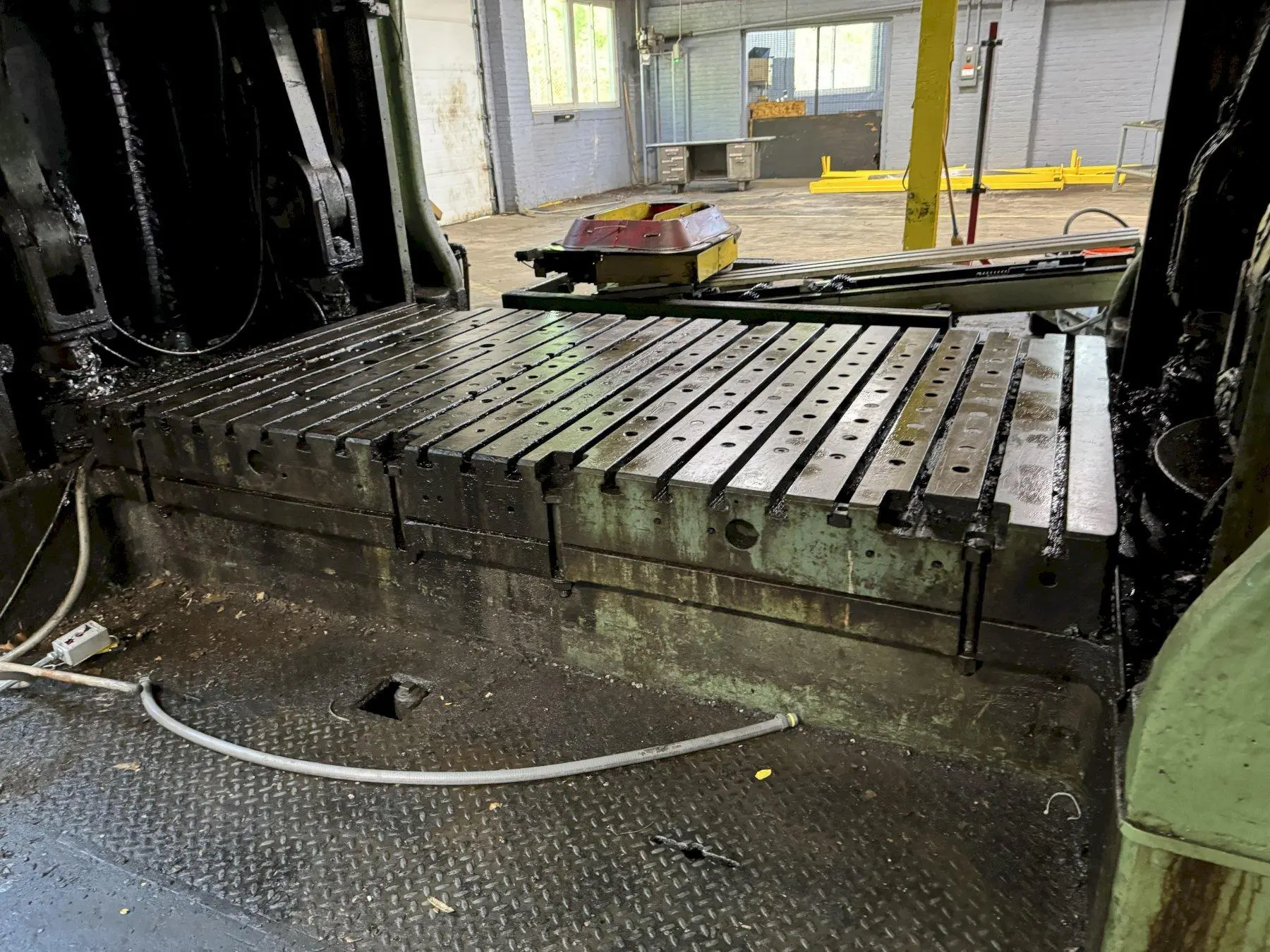 60" WIDE X 108" LONG X 8" THICK T SLOTTED BOLSTER PLATE. STOCK # 0471324