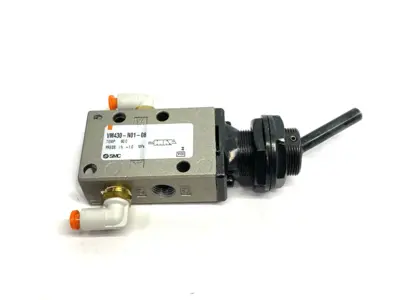USED SMC MECHANICAL TOGGLE VALVE W/ ACTUATORS, BODY PORTED 1/8" NPT