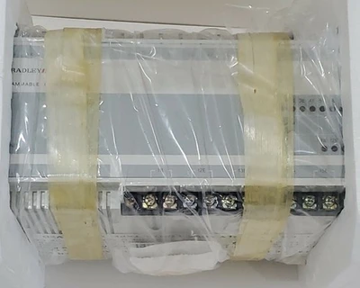 NEW Allen-Bradley 1745-E104