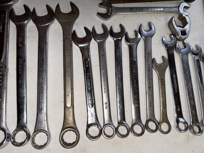 (1) tool box filled with assorted box end wrenches.