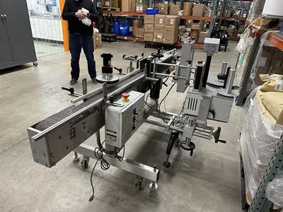 Quadrel model Moduline pressure sensitive wraparound labeler
