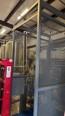 Wild Goose 4 head filler and seamer with depalletizer