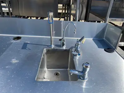 Used Falcon Restaurant Supply Used 136" Stainless Steel Counter with 2 Sink Compartments, Faucets and Ice Bin - SS5 Sinks Illinois US | Falcon Restaurant Supply #1376042