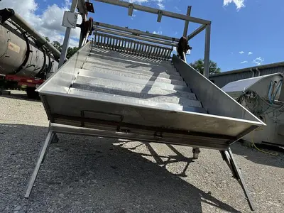 USED MAGNUSON ENGINEERING SHUFFLO FEEDER AND SLICER 54" WIDE