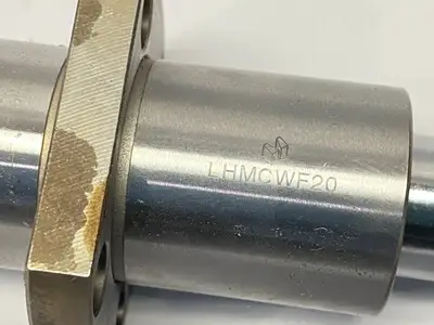 USED MISUMI CENTER FLANGED LINEAR BALL BEARING 20MM DIAMETER W/ SHAFT 200MM