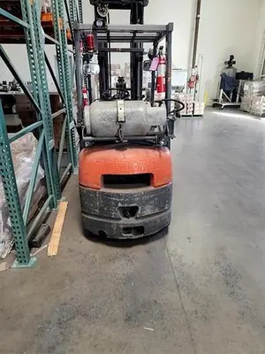 Toyota model 7FGCU15 3000 lb Propane Riding Forklift