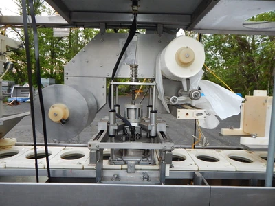 USED AKRAPAK CUP FILLER SS