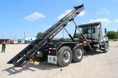 New | in-Stock 2026 MACK GRANITE 64BR Rolloff Trucks Texas US | Roll Off Truck World #1491875