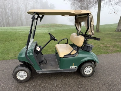 (1) 2015 E-Z-Go golf cart with a Kawasaki gas engine, includes canopy, fold-down windshield, and bal...