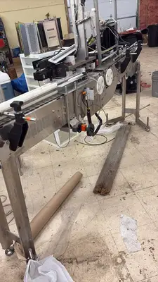 Stainless Steel Automated Conveyor System with Allen-Bradley Controls and Nord Drivesystems Motor