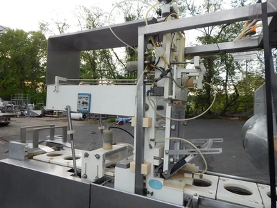 USED AKRAPAK CUP FILLER SS