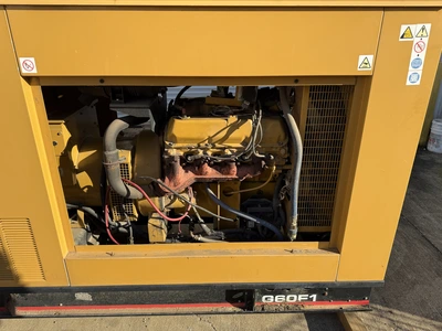 Olympian Nat Gas Generator 60 KW 208/120 V 208.2 AMPS 75 KVA 231