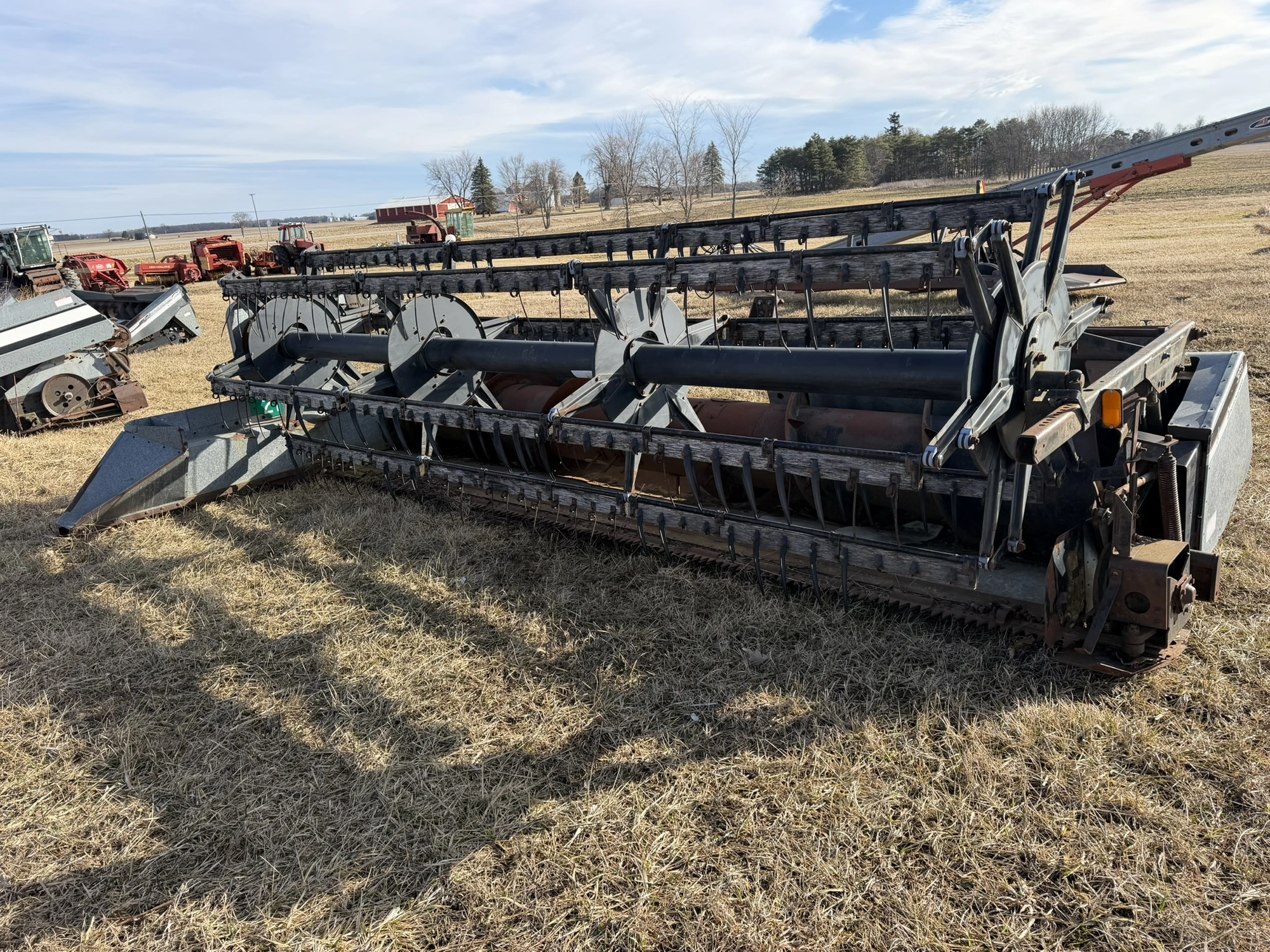 (1) Allis-Chalmers, model 315, 14' grain head with steel and plastic teeth, some teeth are broken, n...