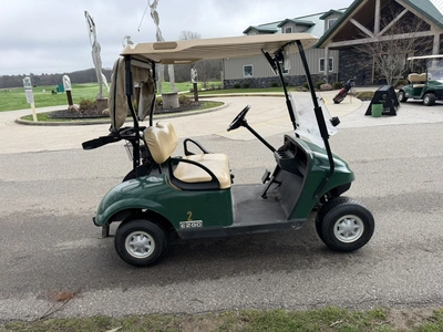 (1) 2015 E-Z-Go golf cart with a Kawasaki gas engine, includes Club canopy and ball washer, fold-dow...