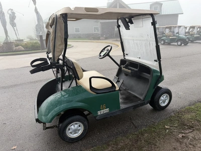 (1) 2017 E-Z-Go golf cart with a Kawasaki gas engine, model 625111G01, includes canopy, ball cover, ...