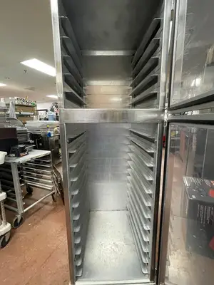 Used Nu-Vu Used Nu-Vu Full Height Dutch Door Enclosed Bread Cabinet Pan Rack - SS303 Food Storage & Transportation Illinois US | Falcon Restaurant Supply #1375787