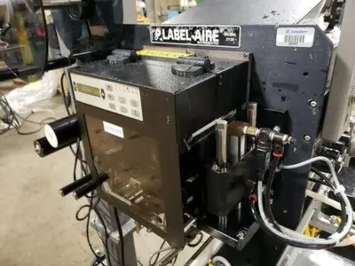 Label-Tronix, labeling system with Lable-Aire 2138 & Reliant 2700 feeder