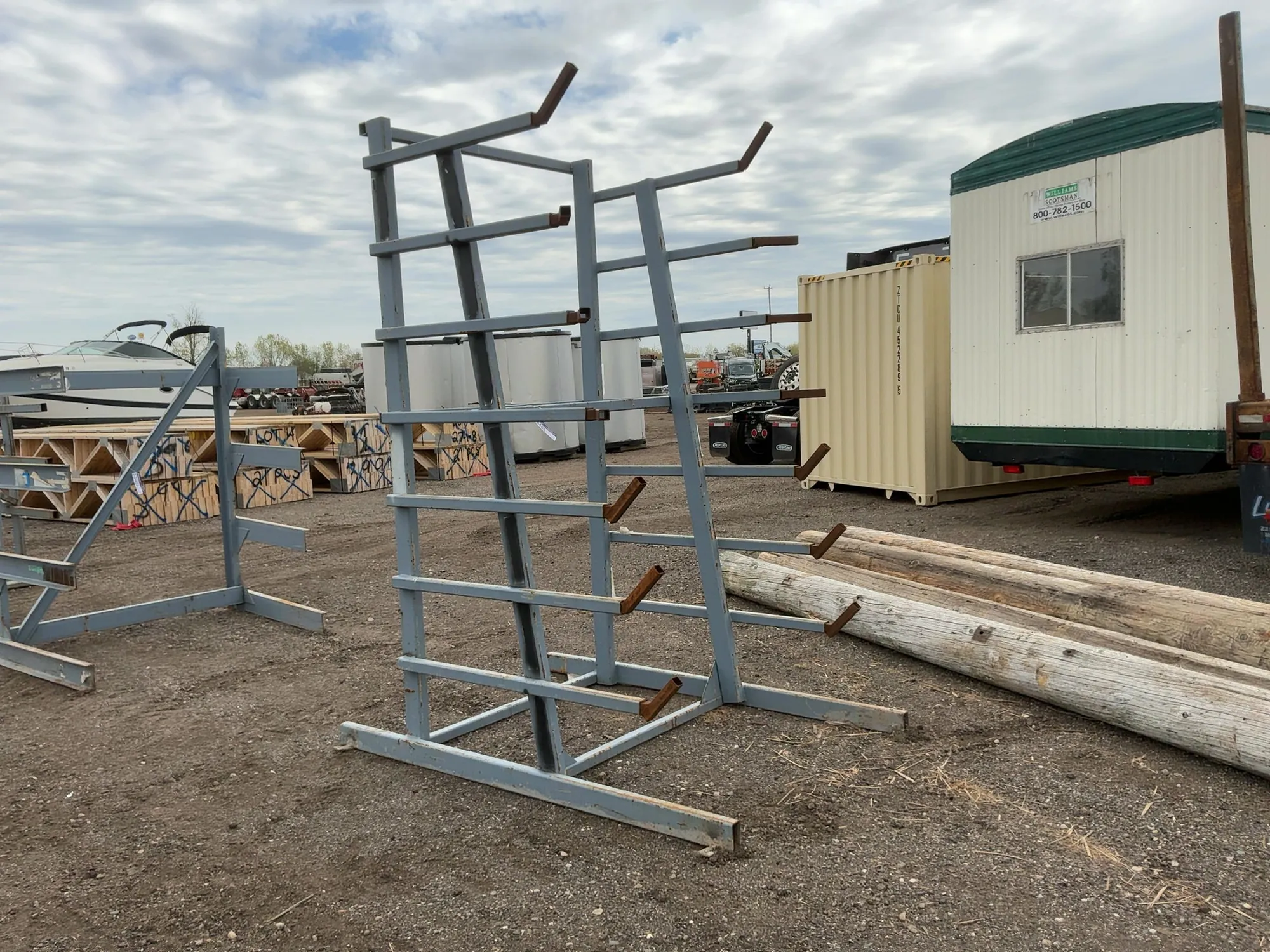 Metal 8-Tier Cantilever Rack, welded together, arms stick out approx. 20” and have metal brackets th...