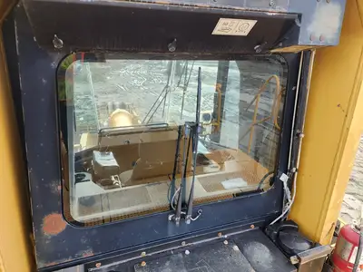Used 2004 CATERPILLAR 990 Skid Steer Loaders British Columbia CA | Lenmark #277799