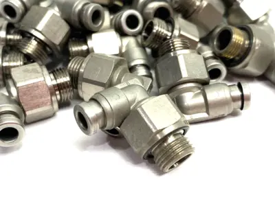 USED SMC METAL MALE ELBOW SWIVEL FITTING 10MM OD TUBE