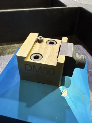 (2) 5th Axis R96-DM50 Riser Plates One With DM50 Dovetail Vise/Clamp and (1) With Two 5th Axis