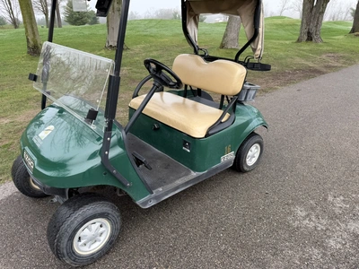 (1) 2015 E-Z-Go golf cart with a Kawasaki gas engine, includes ball washer and Club canopy, ball cov...