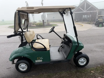 (1) 2017 E-Z-Go golf cart with a Kawasaki gas engine, model 625111G01, includes canopy, ball cover, ...