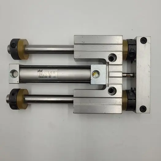 Used PHD PHD SDD22 X 2  5-RER-PR-J2-M-H4 PNEUMATIC CYLINDER CONNECTED TO PHD FRAME SDD22X2  5-AE-PR-J2-M Pneumatic Cylinders | ND Industrial Surplus #1218180