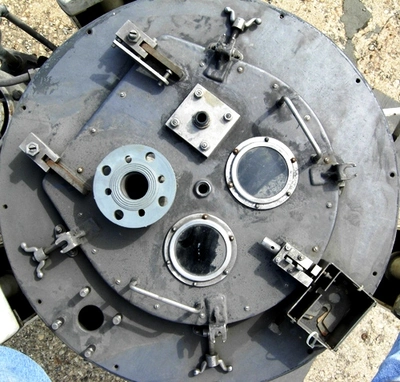 Ametek 26 X 12 perforate basket centrifuge, rubber-lined.