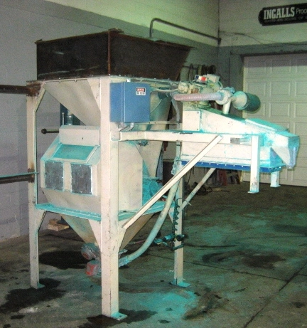 Steel hopper with rotary valve and spiral feeder