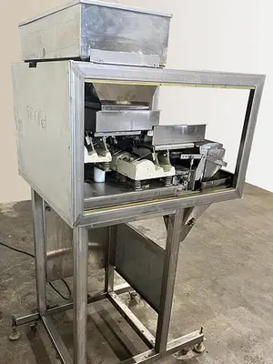 Vibratory Net Weight Bucket Filler