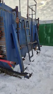 USED 30 M3 (192 BBL) SKID MOUNTED 2 COMPARTMENT MUD TANK