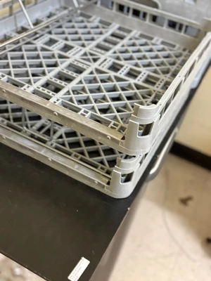 set of dishwasher racks and silverware holders