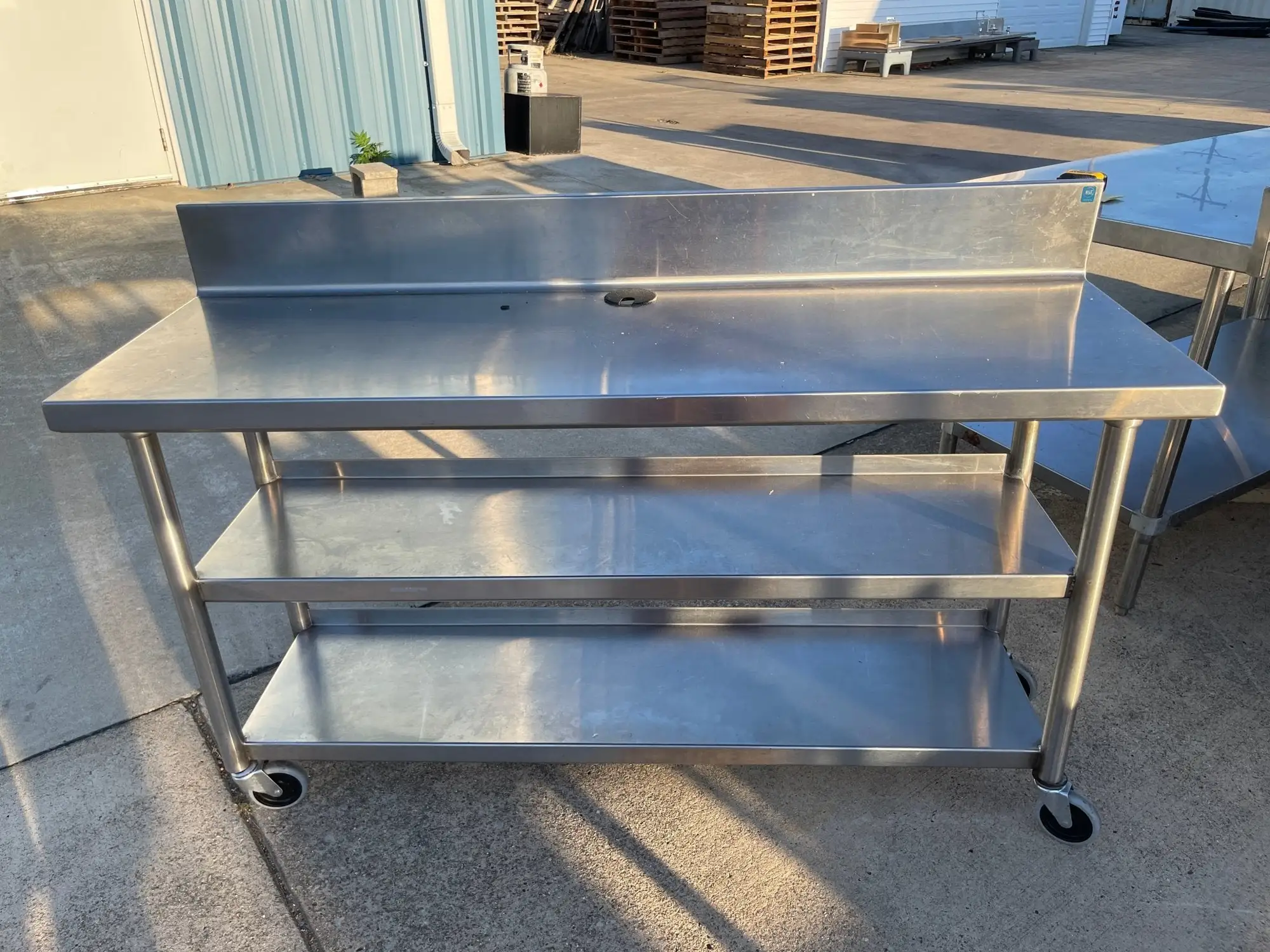 Used Falcon Restaurant Supply Used 60"x20" Heavy Stainless Table with Shelves, Casters and 6" Backsplash JD - SS323 Food Prep Tables Illinois US | Falcon Restaurant Supply #1375164
