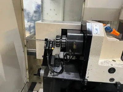 USED 1999 ROLLOMATIC CNC600X