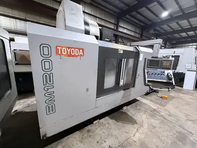 Used 2006 TOYODA AWEA BM1200 Vertical Machining Centers Illinois US | Machinery Marketing International #1211144