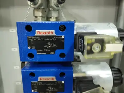 USED REXON 4WE 10 Y33/CG24N9K4