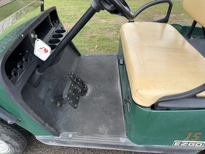 (1) 2015 E-Z-Go golf cart with a Kawasaki gas engine, includes Club canopy, ball washer, fold-down w...