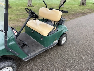 (1) 2015 E-Z-Go golf cart with a Kawasaki gas engine, does not include Club canopy, includes ball wa...