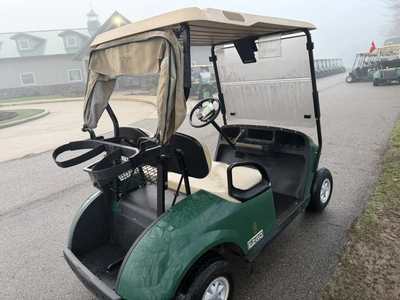 (1) 2015 E-Z-Go golf cart with a Kawasaki gas engine, includes canopy, ball cover, club cover, fold-...