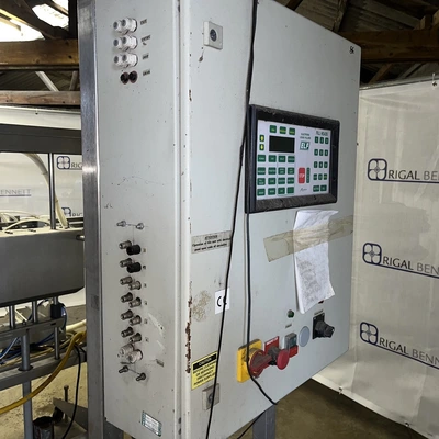 6 Head ELF Filler with feed tanks & container link belt conveyor