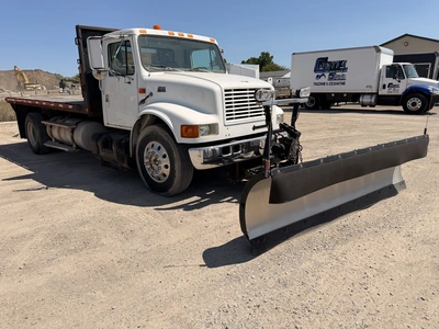 Used 1999 INTERNATIONAL 4700 4X2 WITH 10' SNOW DOGG PLOW Flatbed Trucks Michigan US | Miedema Asset Management Group #1410944