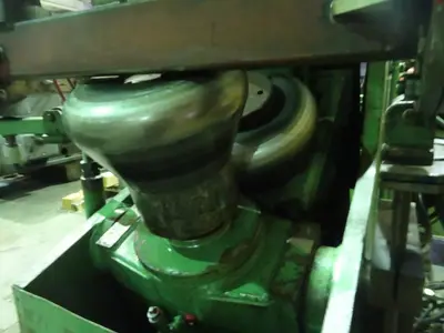 USED HAEUSLER FLANGING MACHINE
